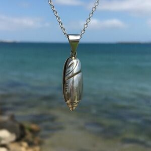 Vintage Taxco Mexico Sterling Silver Lettered Olive Shell Pendant. 10 Grams